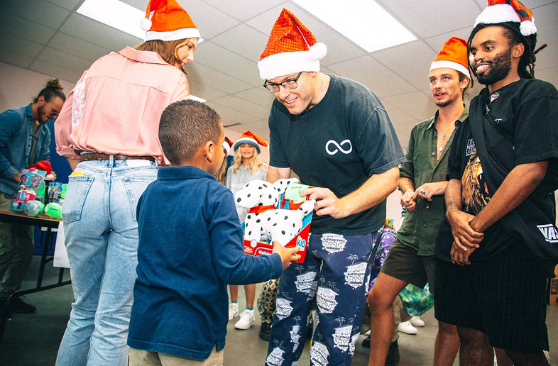 Karmagawa & Timothy Sykes give to the Boys & Girls Clubs of Miami December 6, 2019 © 2019 Millionaire Media, LLC