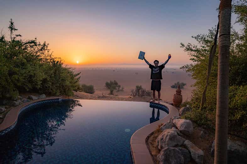 Tim Sykes celebrates the sunset in Dubai after creating his watchlist
