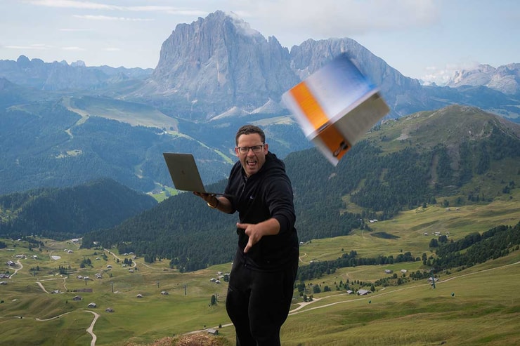 Tim Sykes tosses his book An American Hedge Fund in the Alps